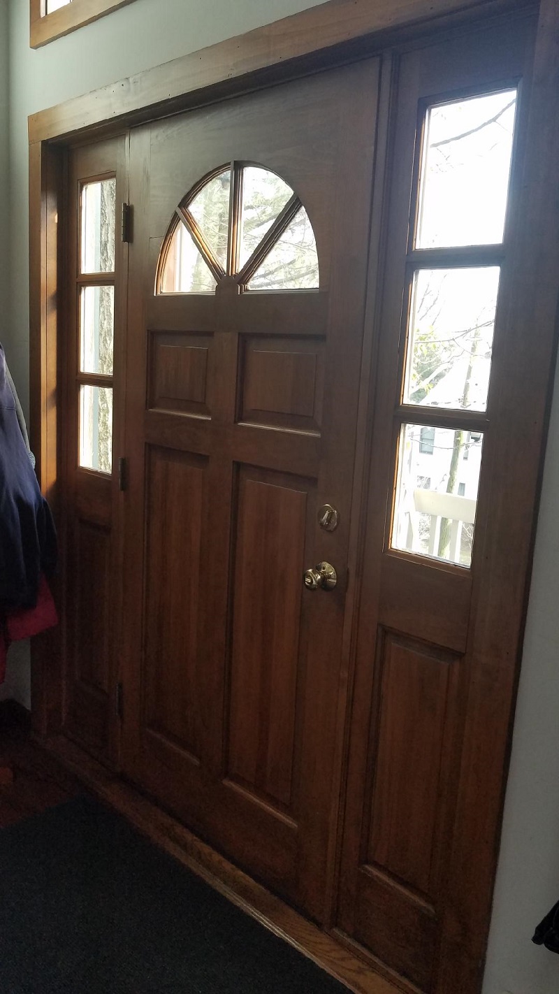 Old wooden door which is warped